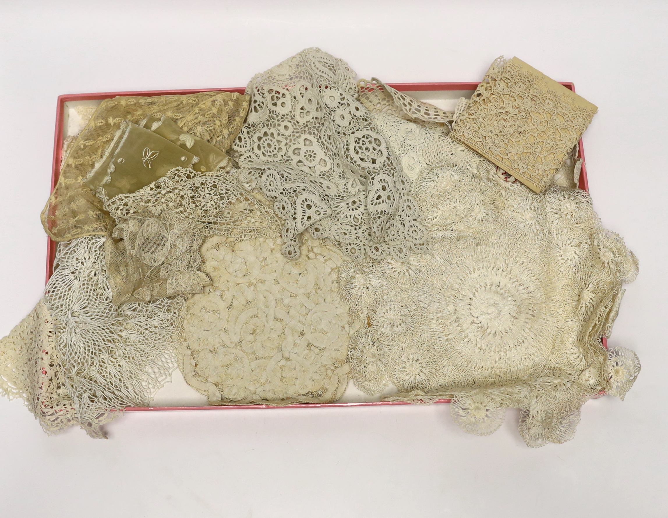 Two 19th century silk baby gowns, a ladies lace trimmed bonnet, a black satin and lace maids apron, various tatting tape lace and other table mats, etc.